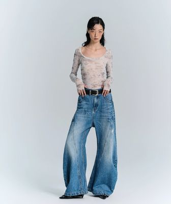 Jeans a gambe larghe di tessuto denim decostruito per uomini e donne in abbigliamento da strada in taglia più grande