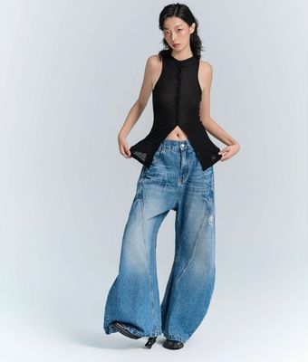 Jeans a gambe larghe di tessuto denim decostruito per uomini e donne in abbigliamento da strada in taglia più grande