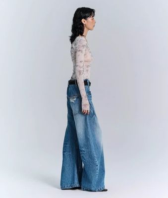 Jeans a gambe larghe di tessuto denim decostruito per uomini e donne in abbigliamento da strada in taglia più grande