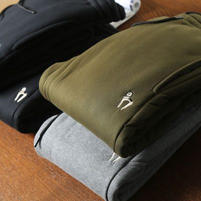 100% di cotone ricamo Uomo lana rivestita Corridori caldi pantaloni imbottiti Pantaloni per la vita media