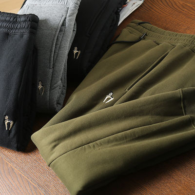 100% di cotone ricamo Uomo lana rivestita Corridori caldi pantaloni imbottiti Pantaloni per la vita media