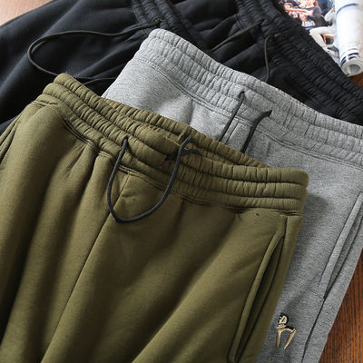 100% di cotone ricamo Uomo lana rivestita Corridori caldi pantaloni imbottiti Pantaloni per la vita media