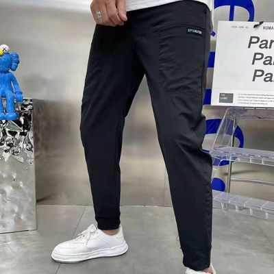 Flat Front Style Pantaloni da carico maschile In stock con bottoni personalizzati Corridori di fitness sciolti