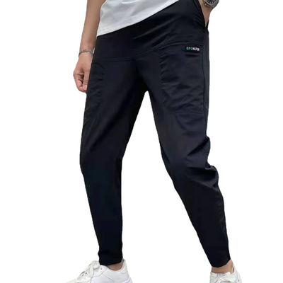 Flat Front Style Pantaloni da carico maschile In stock con bottoni personalizzati Corridori di fitness sciolti