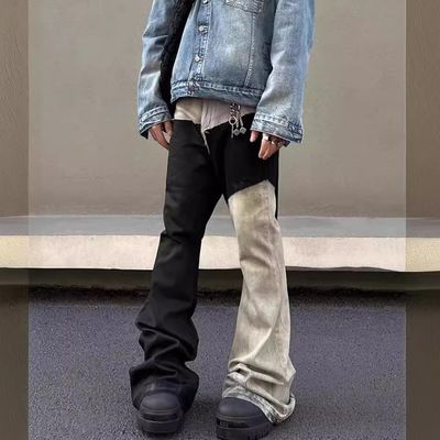 Mid Waist Denim Fabric Custom Washed Raw Edge Patchwork Flared Pants Jeans Per Uomini