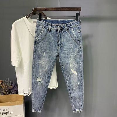 Pantaloni da disegnatore per uomini jeans pantaloni snelli per uomini tagliati articoli in stock