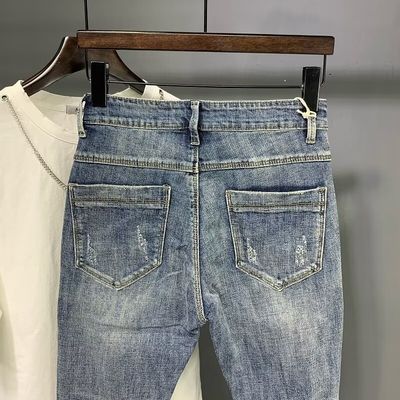 Pantaloni da disegnatore per uomini jeans pantaloni snelli per uomini tagliati articoli in stock