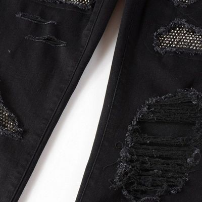 Fascia a doppio strato di design pieghevole nero Strass impilato jeans skinny denim per uomini